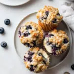 Blueberry Cheesecake Stuffed Crumble Muffins