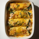 Cheesy Chicken Spinach Stuffed Crepes Bake